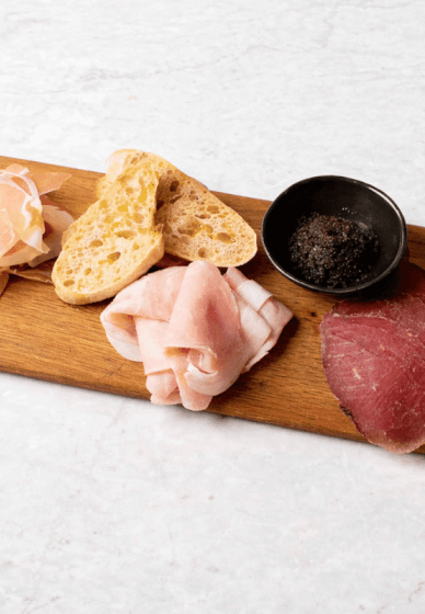 Charcuterie Board and 1 Carafe of Wine