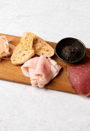 Charcuterie Board and 1 Carafe of Wine