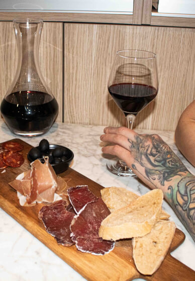 Charcuterie Board and 1 Carafe of Wine