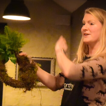 Add a foliage base to the wreath