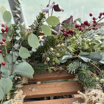 Start by mossing your wire wreath