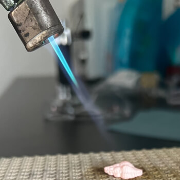 Firing to burn away the binder