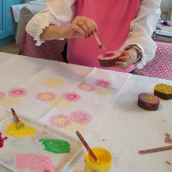 Apply paint to the woodblock