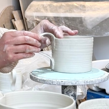 Turning, adding handles and joining clay to clay