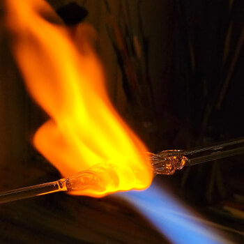 Molten glass in the flame