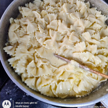 Once done mix cheese cream and seasoningd
