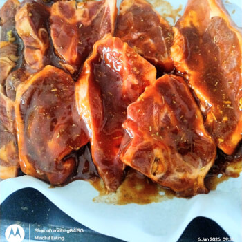Place lamb steaks in tin