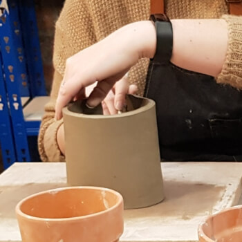 Hand building a mug