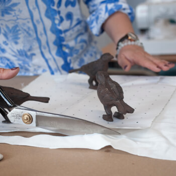 Cutting fabric with fabric scissors