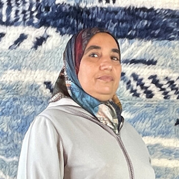 Aicha Kechart,  teacher