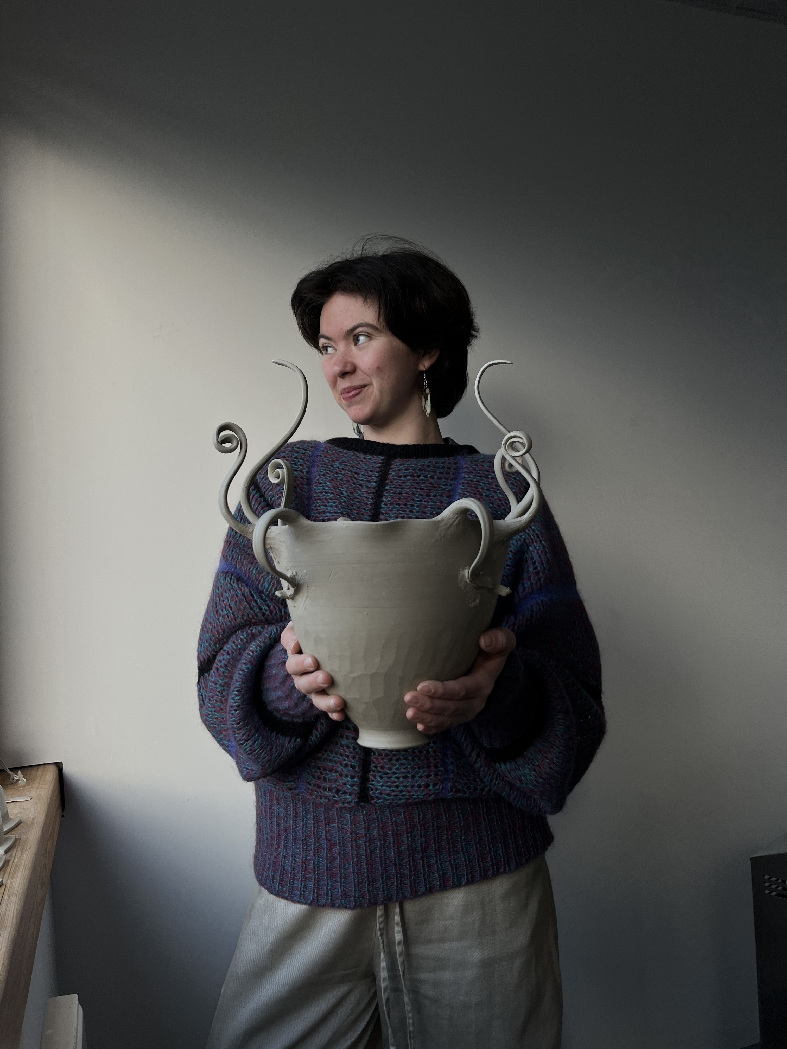 Looshe, pottery teacher