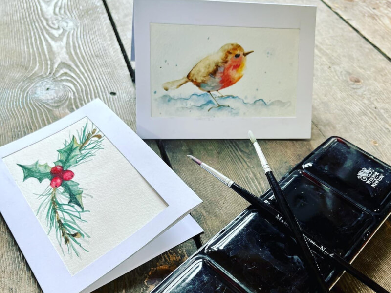 A selection of homemade Christmas cards.