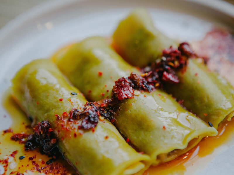 A finished plate of spring rolls made at a cooking class