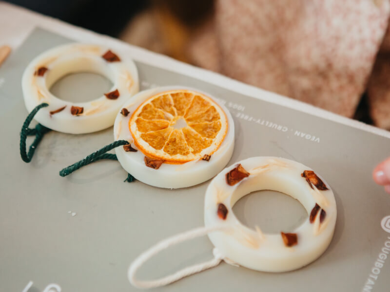 A close up of two eco-Christmas ornaments