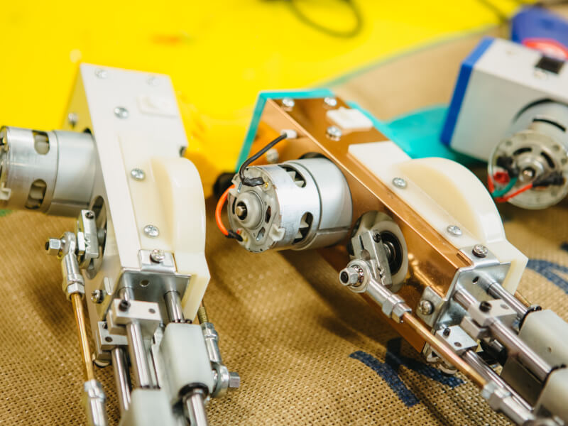 Close up of a pair of tufting guns