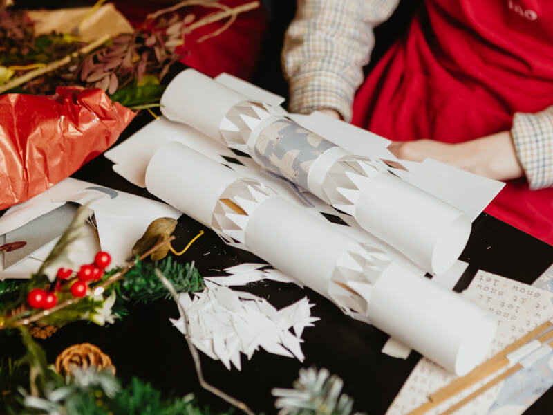 A selection of Christmas decoration materials on a table