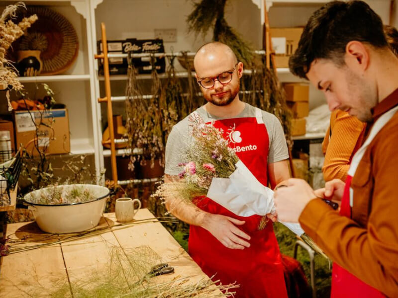 two men at a floristry class