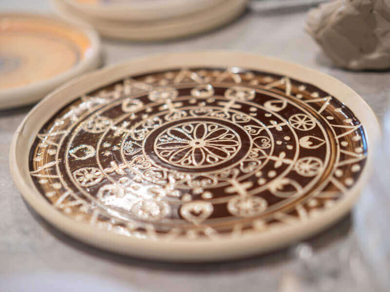 A painted ceramic plate