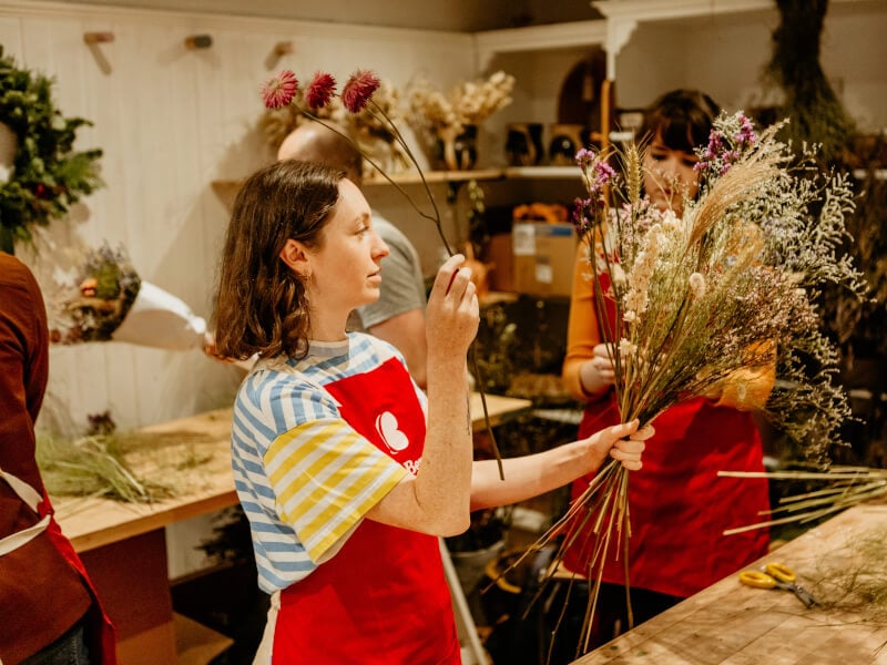 A woman flower arranging in London.