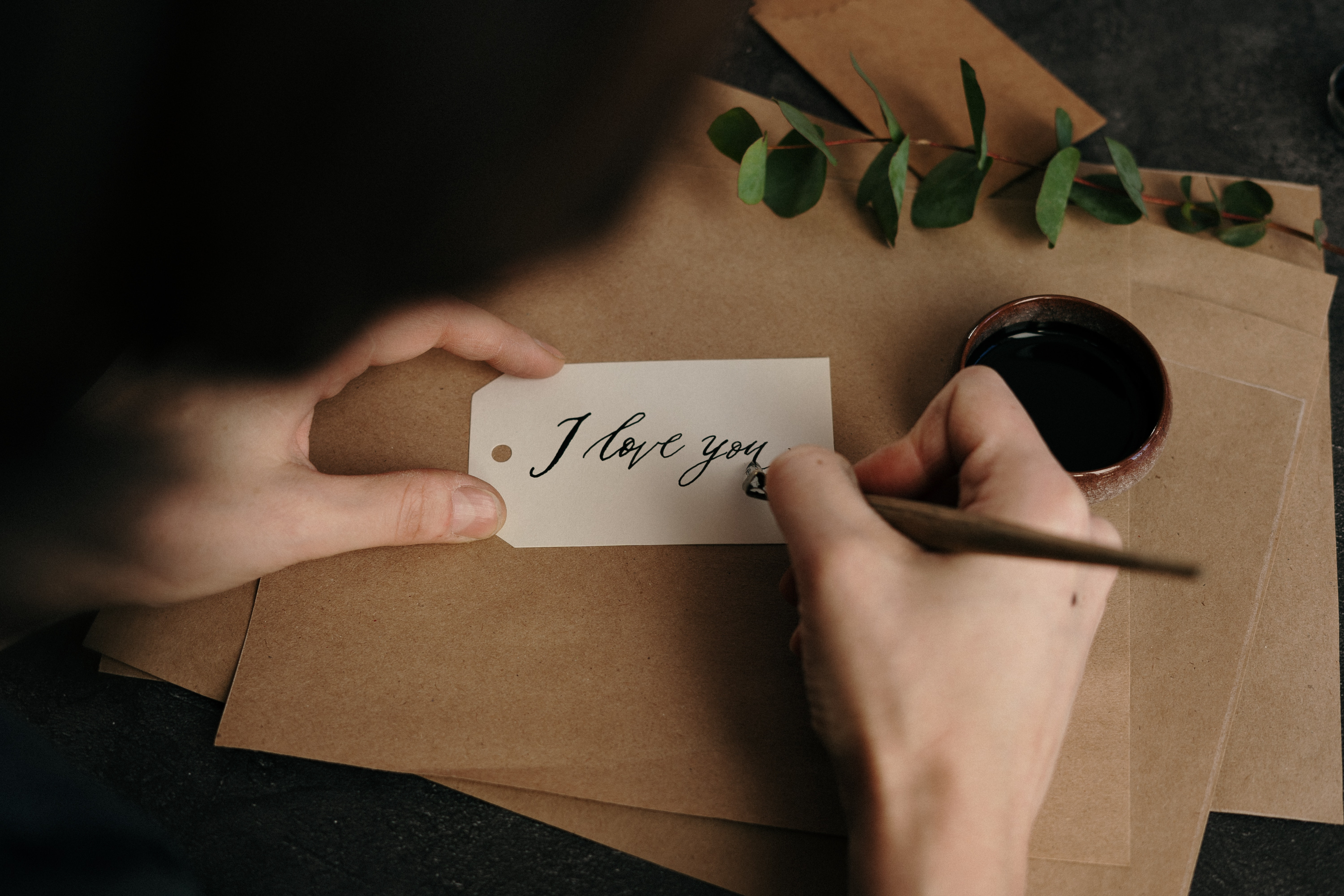 Writing a gift tag with calligraphy