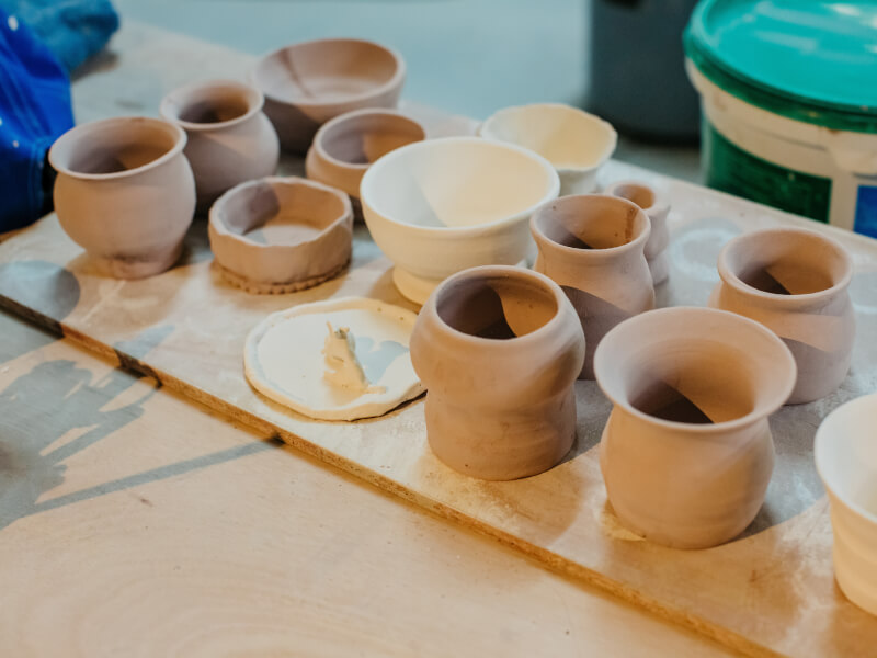 Handmade pots at a pottery making class. 