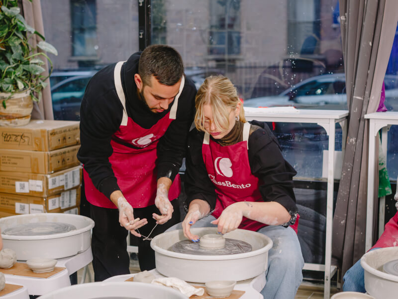 A group of people at a pottery class