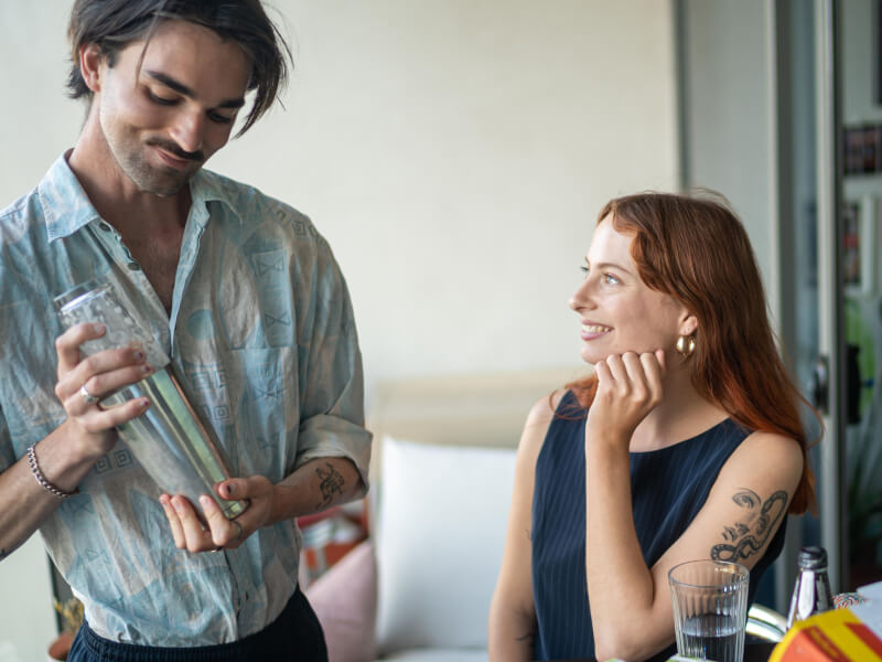 A couple learn how to make cocktails together.