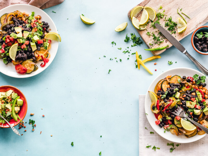 Several bowls on a table, filled with vegan ingredients