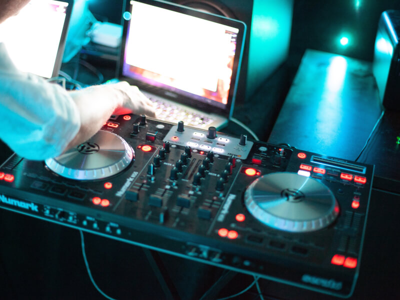 Learn to DJ using a spin deck.