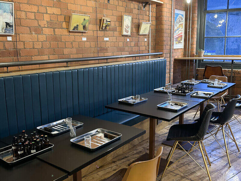 A table set up for a perfume making class
