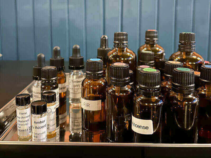 Bottles of scents and essential oils for a perfume making class