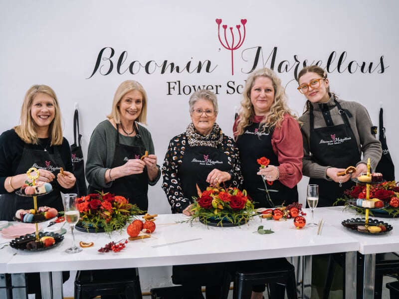 A group of women at a Christmas floristry class