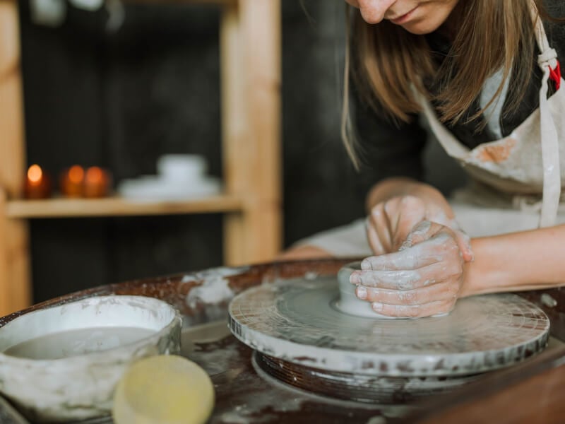 Creating handmade pottery on a wheel