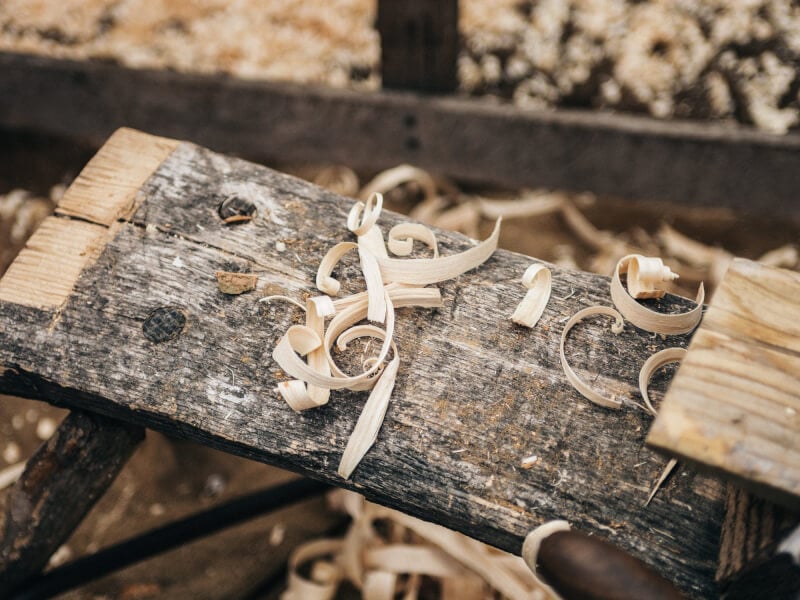 A collection of wood shavings after at a woodworking class.