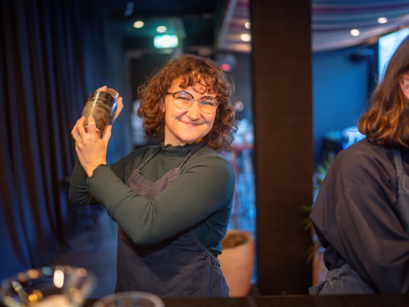 Person shaking cocktail class