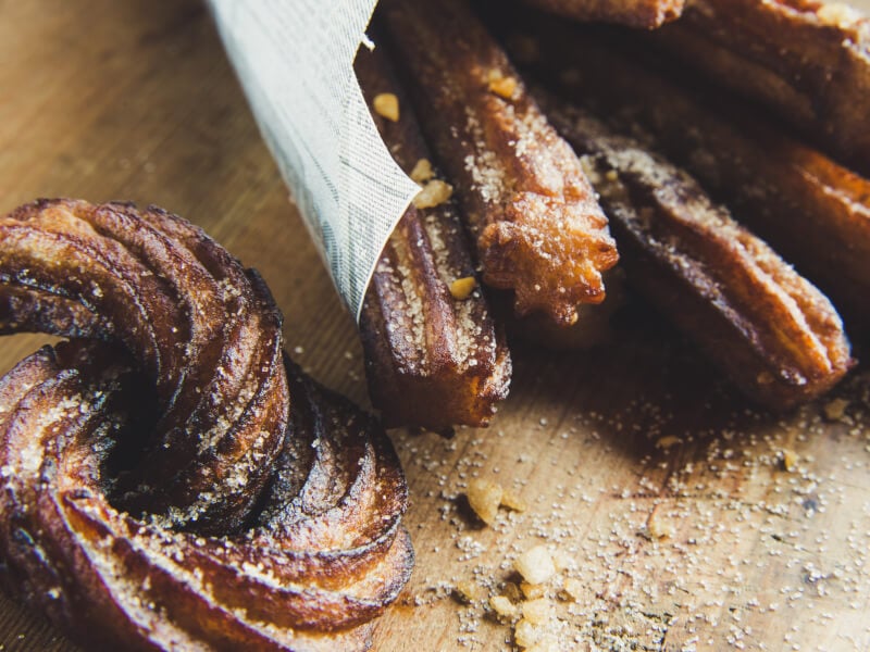 Chocolate churros dusted with sugar