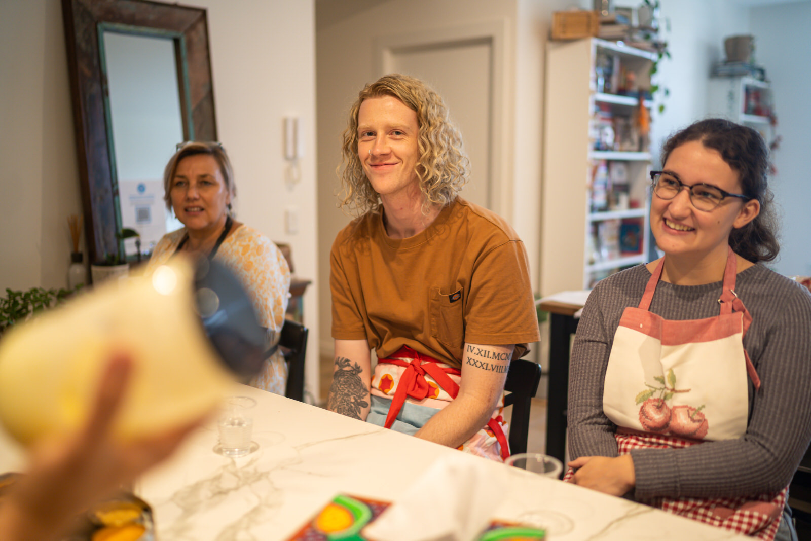 A group of people at an Indian cooking class