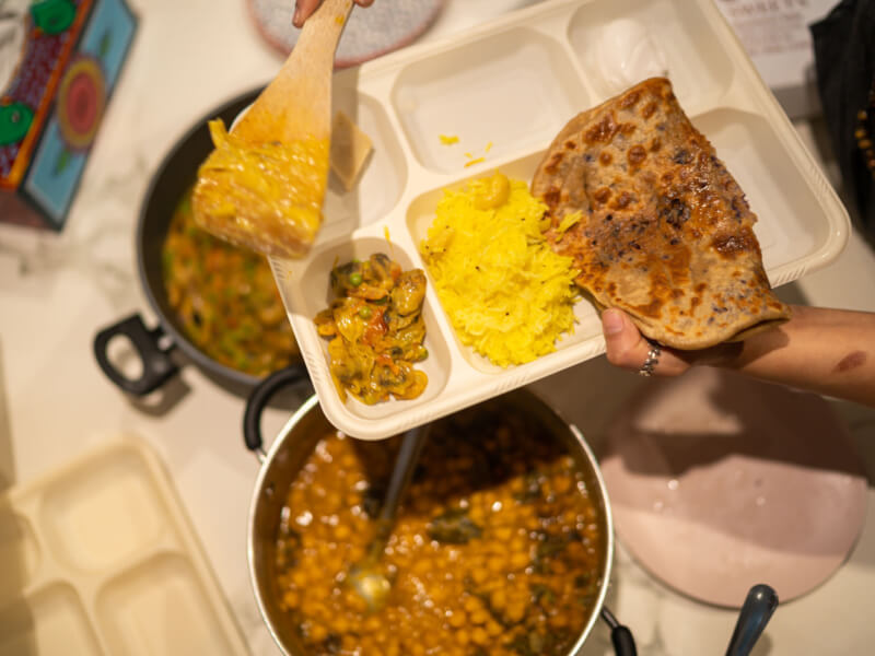 A plate of Indian vegan food made in a cooking class.