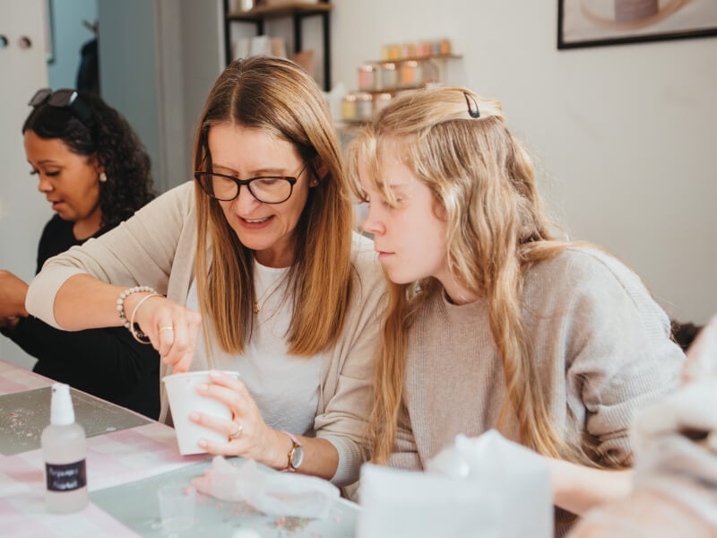 Mum and daughter at a perfume making class