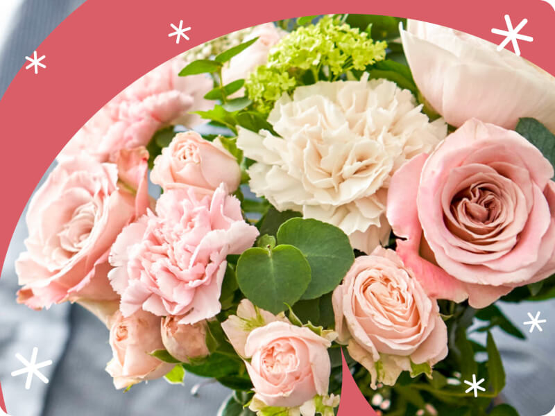 A pink and white bouquet of flowers.