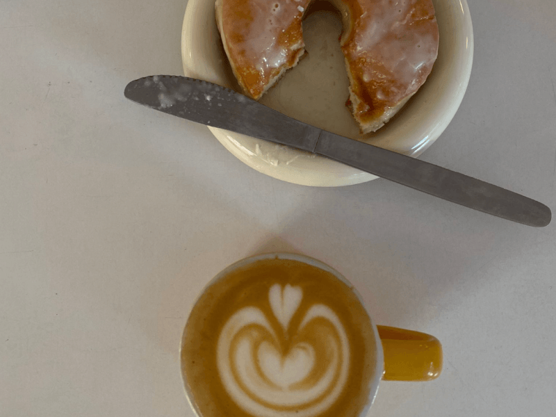 Coffee and a donut at Siop Shop in Manchester