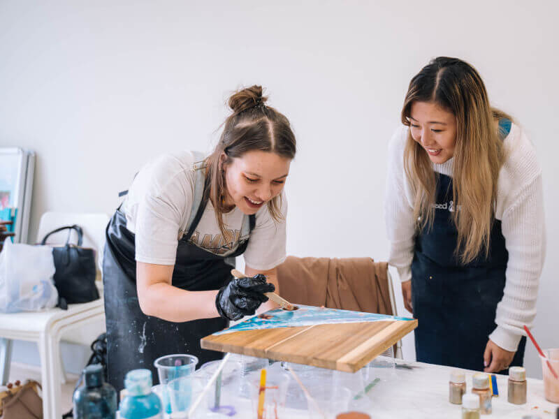 A teacher and a student at an art class