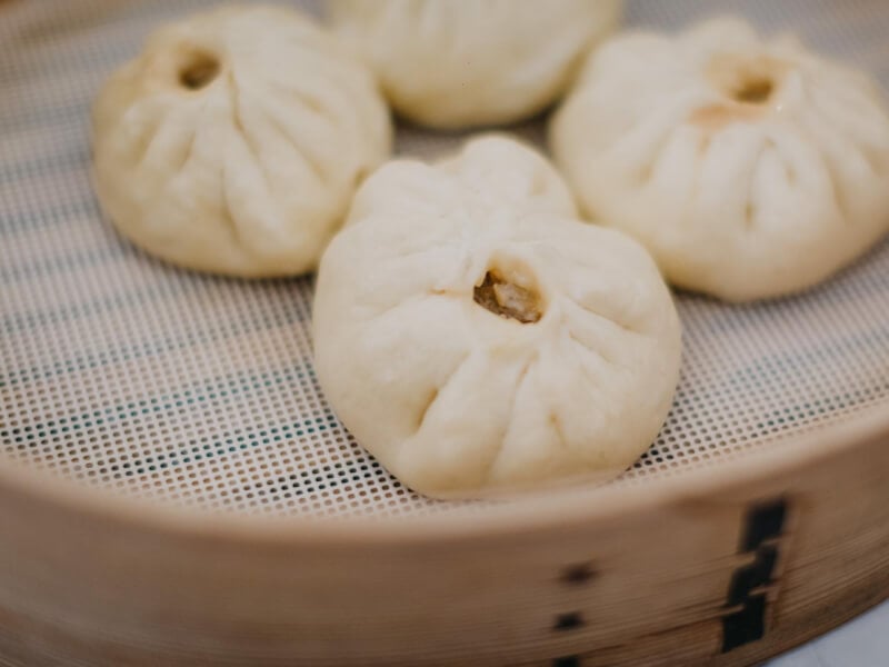 Chinese dumplings in a bamboo steamer