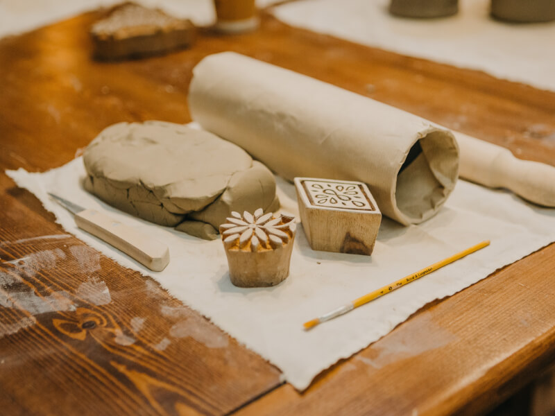 Clay laid out at a pottery class. 