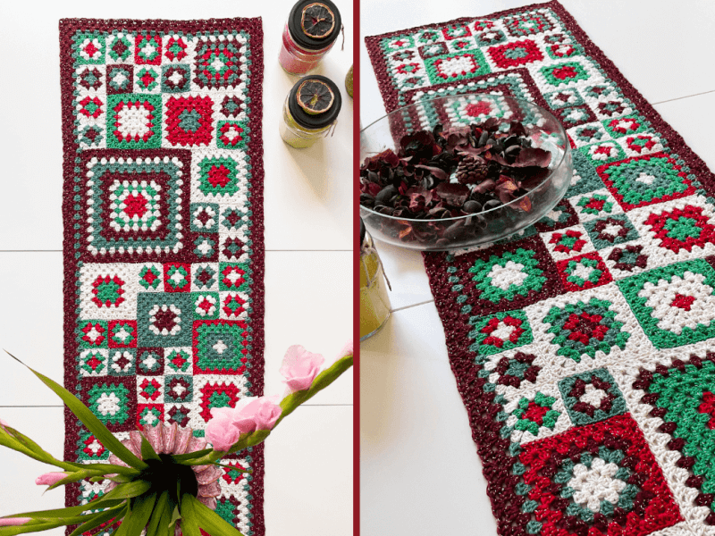 A crochet granny square patchwork rug in red, green, burgundy and white