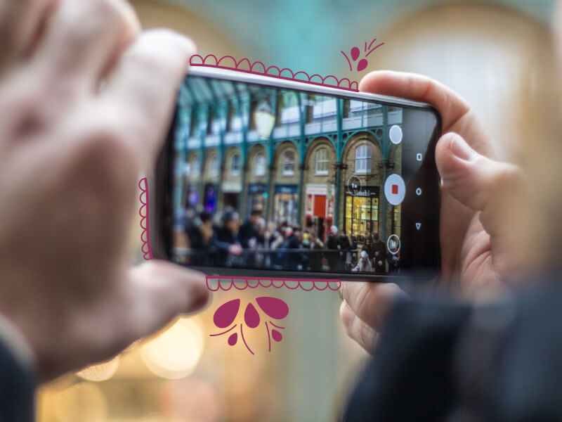 An iPhone camera takes snaps of the city.