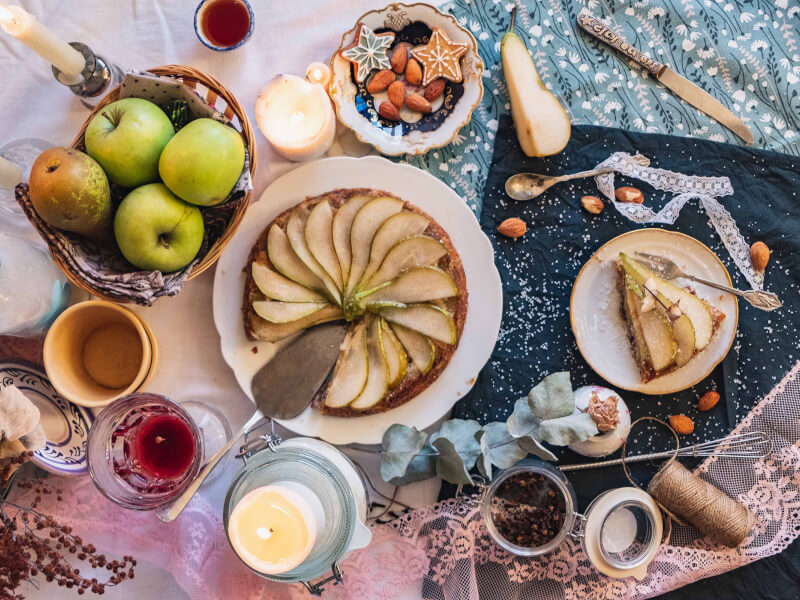 A dessert with a slice cut out of it on a table