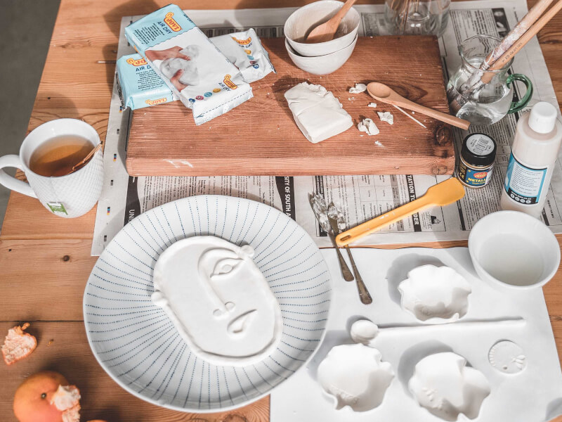 A piece of handmade pottery artwork in the process of being created