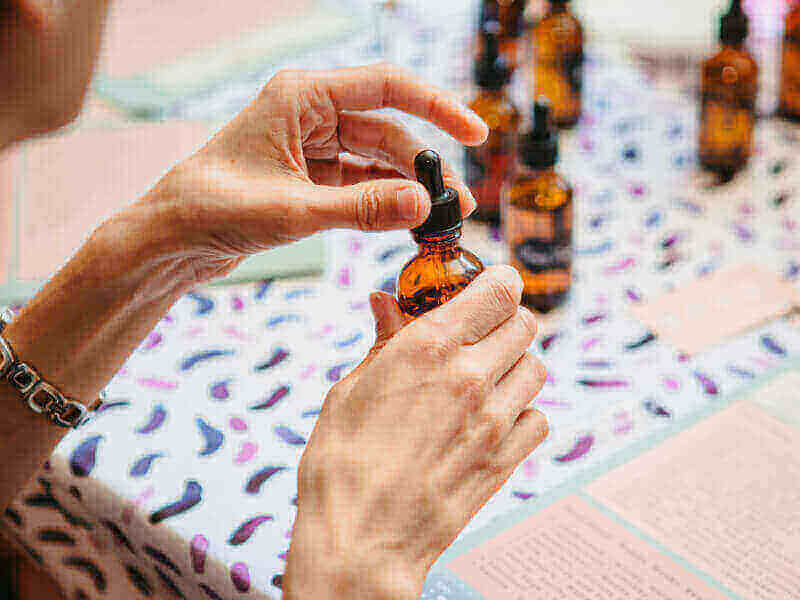 Bottles of scents and oils in a perfume making class