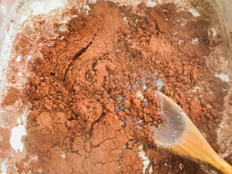 Mixing the wet and dry ingredients in the Spanish chocolate rice cake recipe